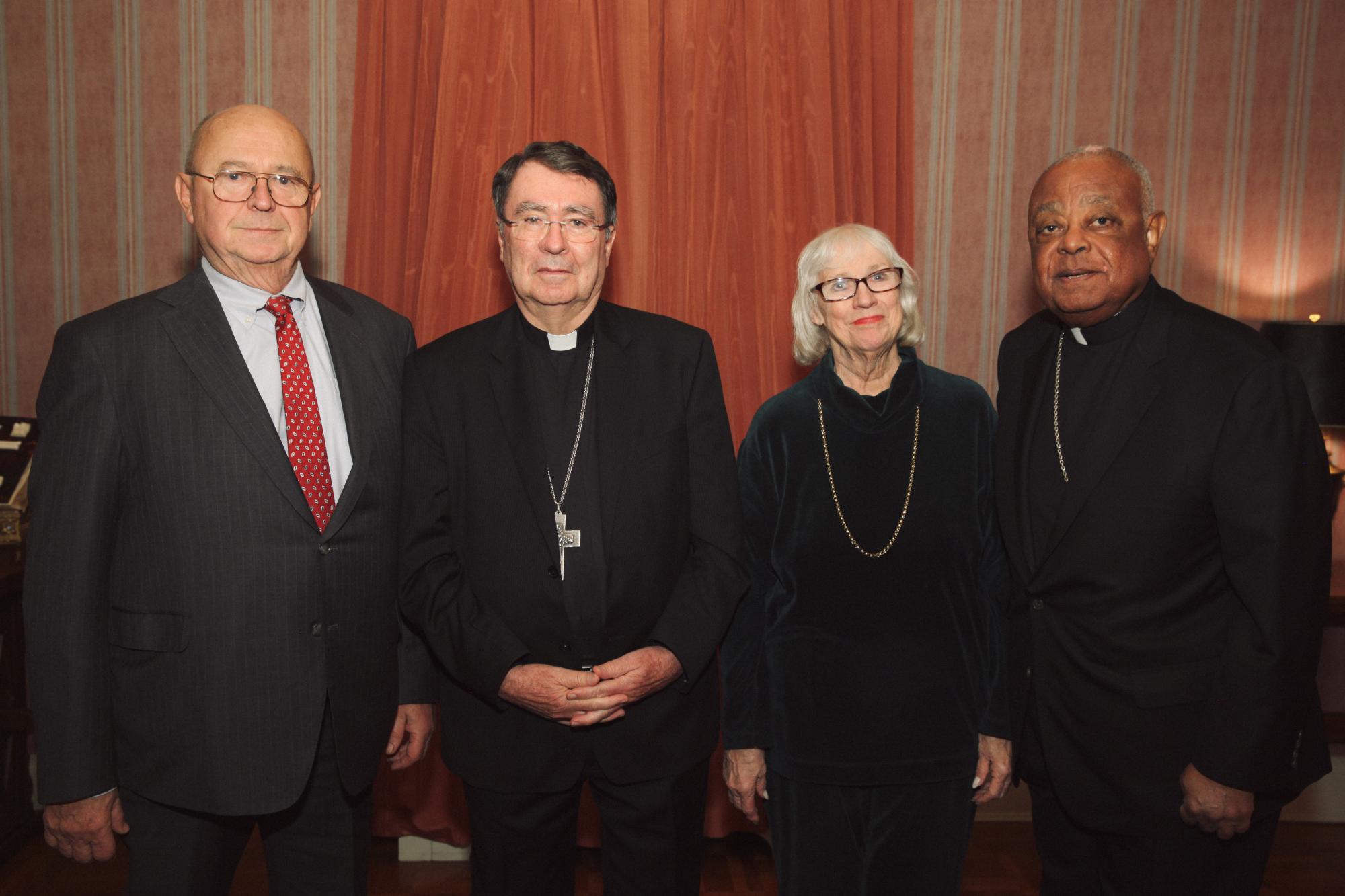 Nuncio stands with honorees