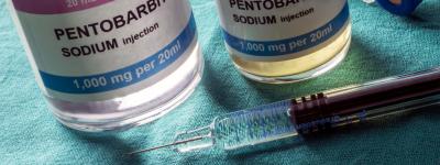 bottles of pentobarbital and syringe