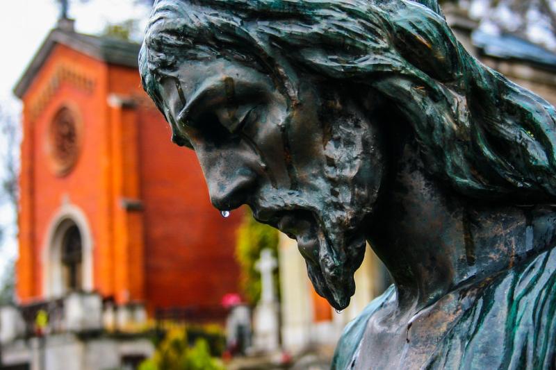 Statue of Jesus with water dripping down his face