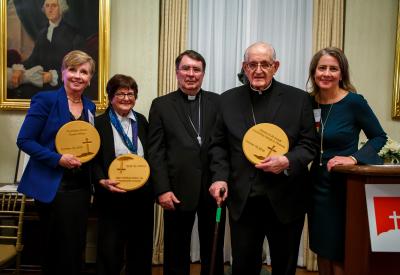 In 2019, Abp. Fiorenza, Karen Clifton and Sr. Helen Prejean, CSJ were honored at CMN's 10th Anniversary event. Pictured here with their awards as well as Apostolic Nuncio, Abp. Christophe Pierre and Krisanne Vaillancourt Murphy, executive director of CMN.