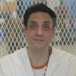 Ivan Cantu sits in visitors cell in prison