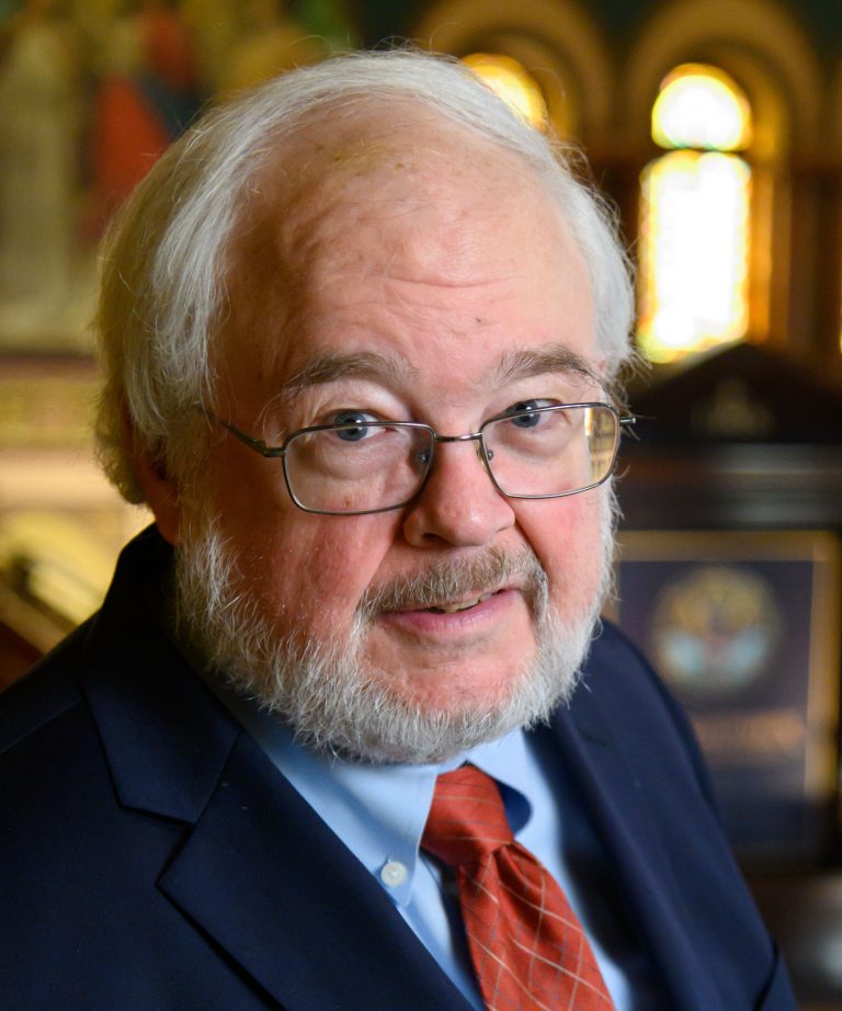 headshot of John Carr